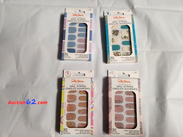 Lot 44-2105g - 4 packages Sally Hansen salon effects Nail Strips. Each package has 32 nail strips 1 prep pad, 1 nail file, 1 cuticle stick.Peel, apply, fil...