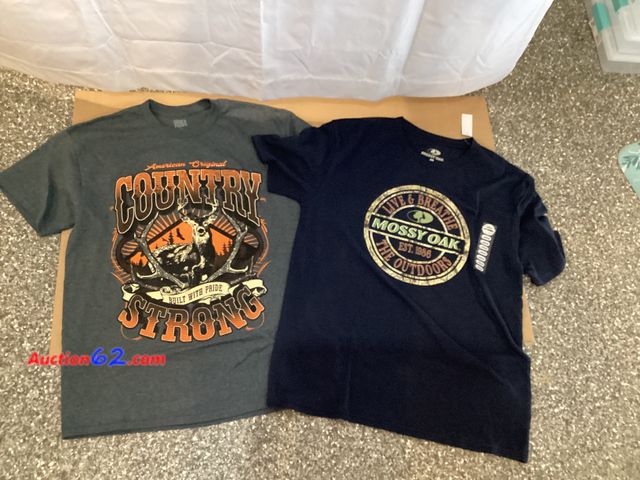 Lot 44-7756i - Lot of (2) Large country T-shirts.  Appears New, A basic inspection has been given to this item. Sold AS-IS. See All Photo's