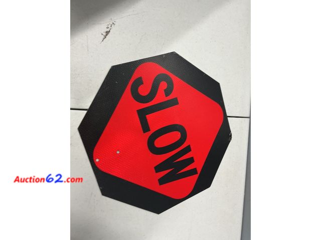 Lot 44-2576a - Lot of 2 Stop and Slow Traffic Signs Appears New, A basic inspection has been given to this item. Sold AS-IS. Not Tested See All Photo's