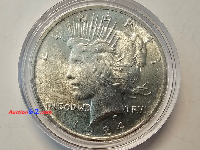 Lot 44-8315p - 1924 LIBERTY HEAD 90% SILVER PEACE DOLLAR. BRILLIANT UNCIRCULATED. MINTED IN PHILADELPHIA. COMES IN AN AIR-TITE CAPSULE-NT