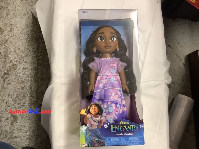 Lot 44-4094w - Isabela Madrigal from Encanto, 
Includes 1 Doll, 1Doll Dress, 1 pair of Doll Shoes,  1 Doll Hair Clip, &amp; 1 Pair of Doll Earrings. New. S...