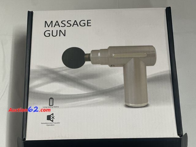 Lot 44-6146j - Massage Gun rechargeable 4 different attachments and charging cord included. See All Photo's Not Tested Never opened, Factory Sealed Unmarke...