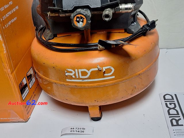 Lot 44-7311b - RIDGID 6 gallon Air Compressor  E-Commerce Return, A basic inspection has been given to this item. Sold AS-IS. Used Tested & Working