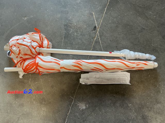 Lot 44-290e - Sunbrella Umbrella with Orange Stripes See All Photo's Appears New, A basic inspection has been given to this item. Sold AS-IS.
