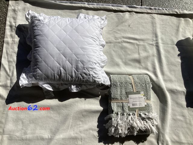 Lot 44-7871P - Lot of (1) white throw pillow &amp; (1) sage green decorative throw.  Appears New, A basic inspection has been given to this item. Sold AS-I...