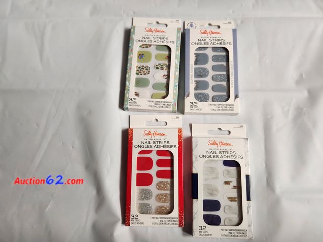 Lot 44-2115g - 4 packages Sally Hansen Salin Effects Nail Strips Easy on peel off Nail polish remover not required. Each box has 32 nail strips, 1 prep pad...