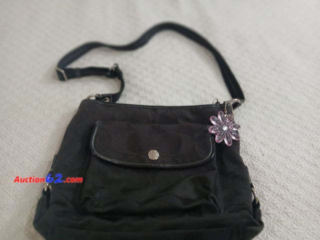 Lot 44-3619m - One authentic very gently used Coach purse, has the pink flower.  Leather patch inside.  Has cell phone and glasses pouches.  Purse without ...