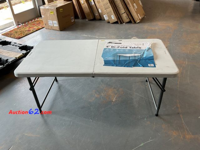Lot 44-600e - Peakform 4 Bi-Fold Table See All Photo's Not Tested E-Commerce Return, A basic inspection has been given to this item. Sold AS-IS. Dirty Scr...
