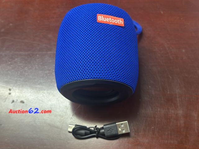 Lot 44-4074f - Bluetooth rechargeable speaker with led light and cable. Color of speaker will vary. NEW. From Gadgets and more. Opened for photo. See All P...