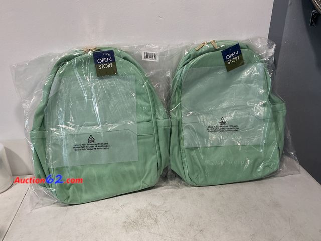 Lot 44-816o - Lot of (2) 21L 17.5'' Canvas Backpack - Open Story Appears New, A basic inspection has been given to this item. Sold AS-IS. See All Photo's ...