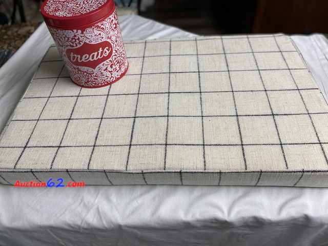 Lot 44-2001o - New. Bark essential approximately 29” L by 18” W dog bed. The Pioneer Woman treat can approximately 7 1/2” H X  6 1/2” W. See photos. Appear...