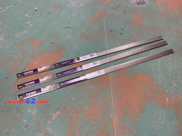 Lot 44-658b - Lot of (3) Total Retail $44- M-D Building Products Fluted 1-9/32 in. W x 36 in. L Anodized Pewter Silver Aluminum Seam Binder 1. Appears New...