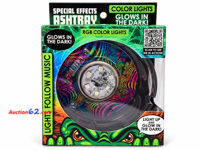 Lot 44-6182m - Light up and Glow in the dark special effects ashtray. Lights follow the music, Appears New, A basic inspection has been given to this item....