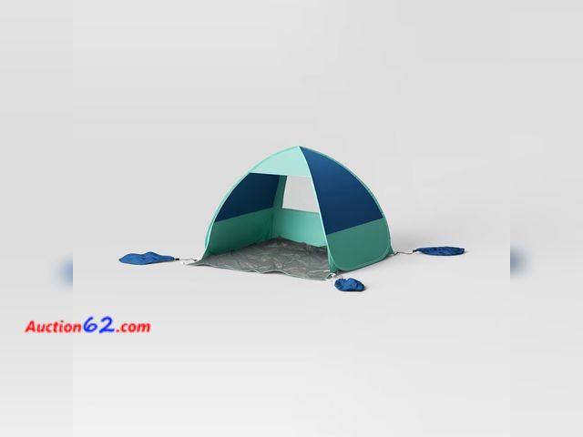 Lot 44-112p - Retail of $60- Beach Pop Up Shelter - Sun Squad™ Appears New, A basic inspection has been given to this item. Sold AS-IS.
