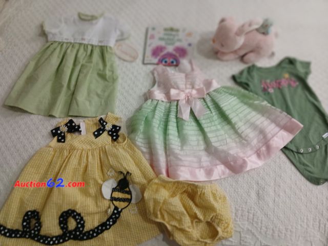 Lot 44-2017i - One new with tags Smocked Giraffe size 12 months girls dress.  One very gently used girls Bobnie Baby Girls dress.  One very gently used Bon...