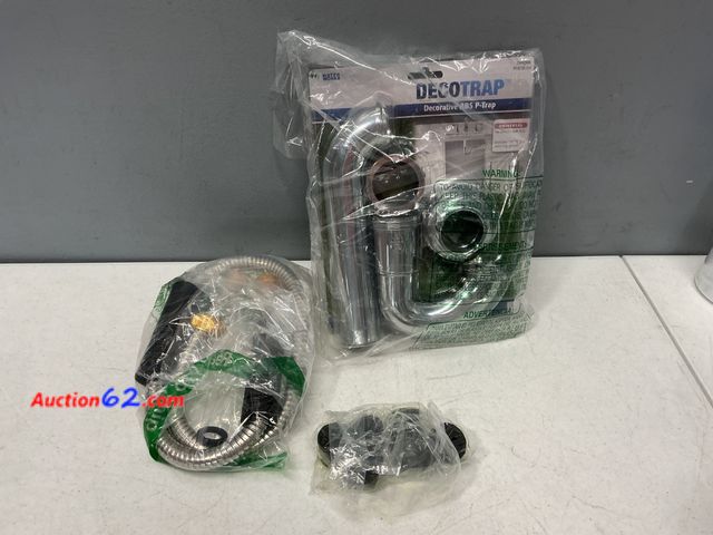 Lot 44-2623m - DECOTRAP Decorative P-Trap &amp; Sink Strainer Set Not Tested See All Photo's E-Commerce Return, A basic inspection has been given to this i...