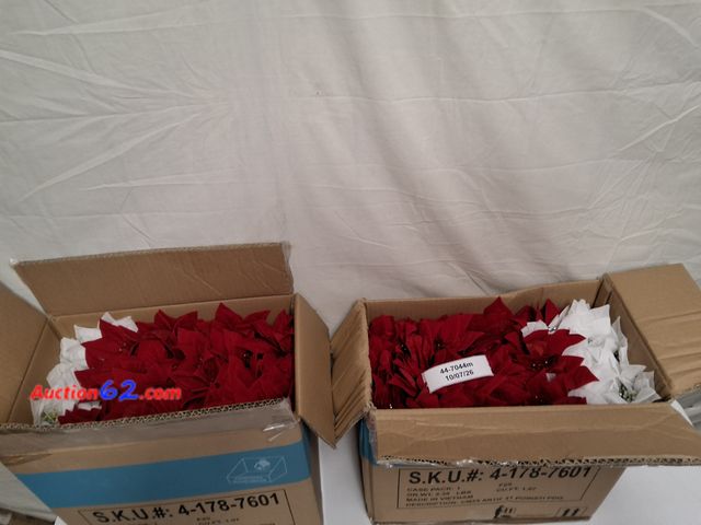 Lot 44-7044m - 2 boxes of 25 artificial poinsettias Appears New, A basic inspection has been given to this item. Sold AS-IS.