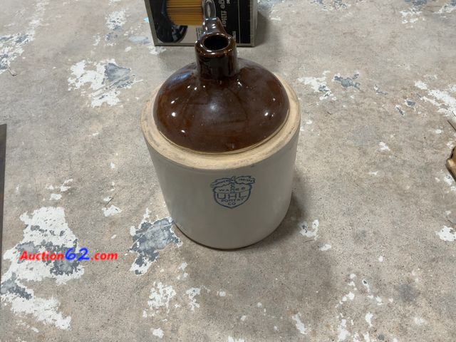 Lot 44-1609t - Uhl Pottery Co. Stoneware Jug - Brown Top, Huntingburg Indiana Not Tested See All Photo's E-Commerce Return, A basic inspection has been giv...