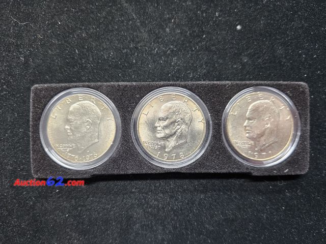 Lot 44-8321o - THREE (3) BRILLIANT UNCIRCULATED EISENHOWER DOLLARS - BICENTENNIAL 1976 D, 1978 AND 1971. THE '71 AND '78 ARE MINTED IN PHILADELPHIA. THEY C...