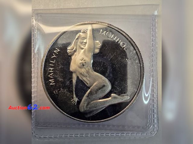 Lot 44-8346g - MARILYN MONROE (1926-1962)/JOE DIMAGGIO "HALL OF FAMER" (INDUCTED 1955) COMMEMORATIVE PROOF .999 SILVER 1 OUNCE ROUND. - NT