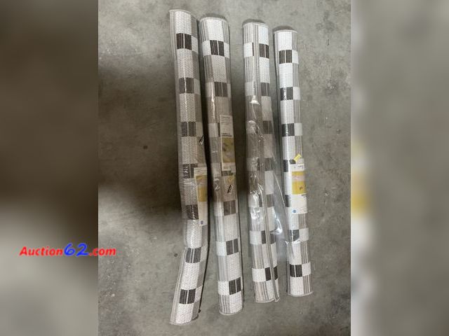 Lot 44-200b - Lot of (4) 3’11” X 5’5” Checkered Outdoor Rugs E-Commerce Return, A basic inspection has been given to this item. Sold AS-IS.