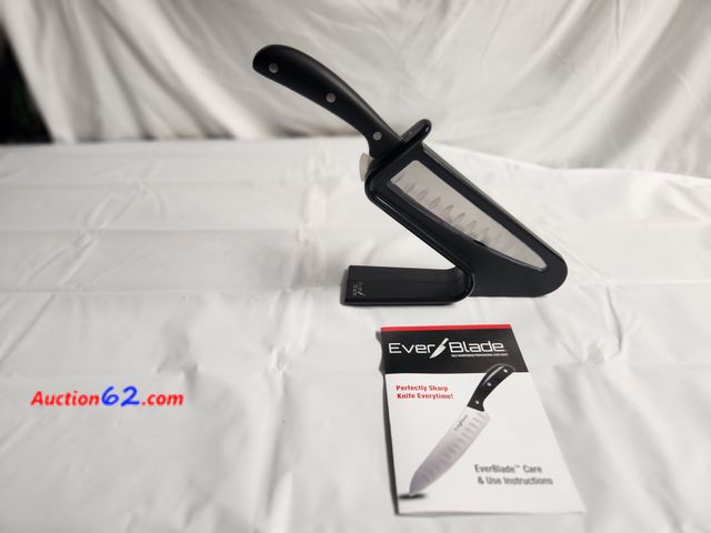 Lot 44-2159g - 1 Ever Blade self sharpening professional chef knife. Perfectly Sharp Knife Everytime. Sharpens each time placed in holder and removed. Dime...
