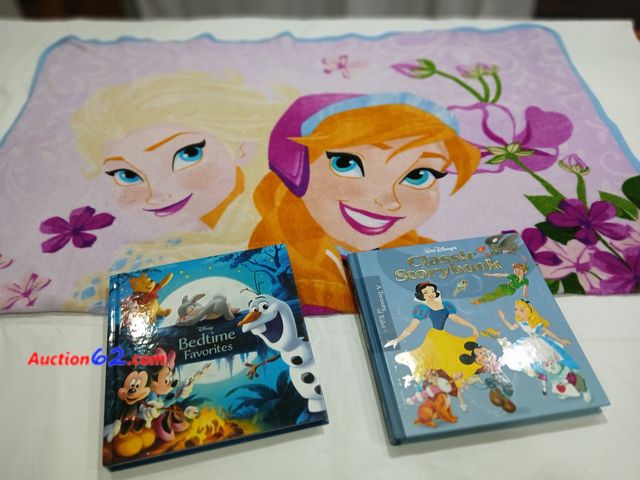 Lot 44-2115w - One new Walt Disney Classic Storybook, retail 15.99. One new Disney Bedtime Favorites book, retail 17.99. Loop One gently used Frozen throw....