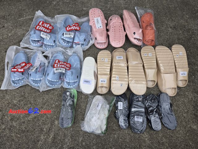 Lot 44-6986p - Lot of 21 Pairs of Sandals Various Sizes  Appears New, A basic inspection has been given to this item. Sold AS-IS.