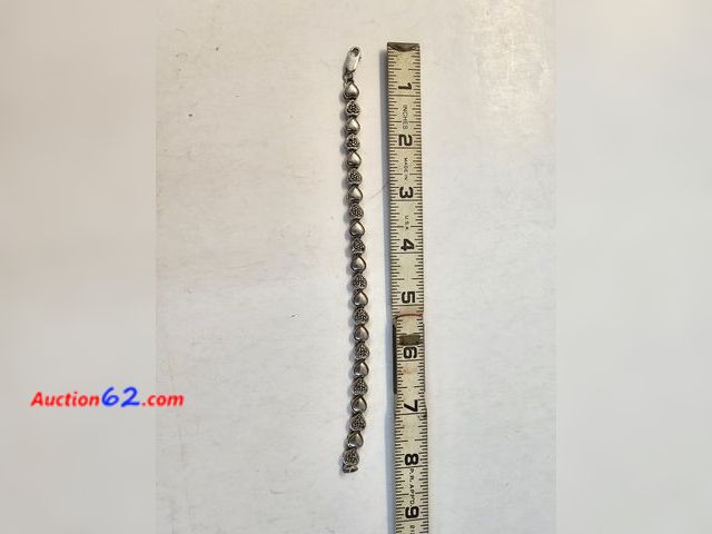 Lot 44-8394w - .925 STERLING SILVER BRACELET LOADED WITH HEARTS.-T