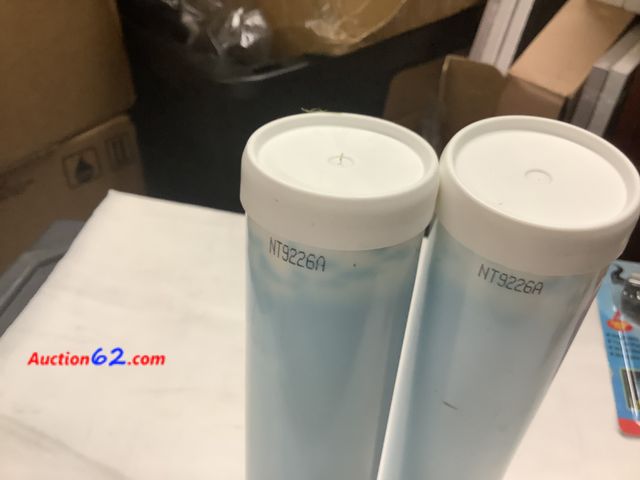 Lot 44-6244e - 2 tubes of grease that fits a grease gun. D.O.C Lubrication Specialists, Formula EM-2, Dennis Oil Company. Appears New, A basic inspection h...