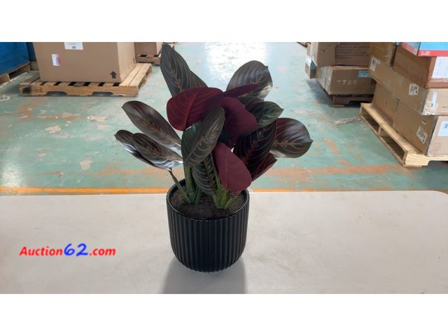 Lot 44-1810a - Black Ribbed Planter with Faux Plant E-Commerce Return, A basic inspection has been given to this item. Sold AS-IS. See All Photo's Not Test...