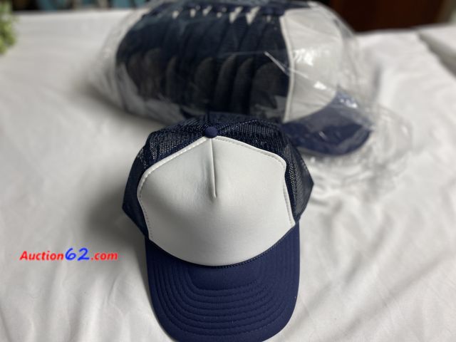 Lot 44-2020o - New. 12 navy with white front mesh back hats. Good for logos. See photos. Appears New, A basic inspection has been given to this item. Sold ...