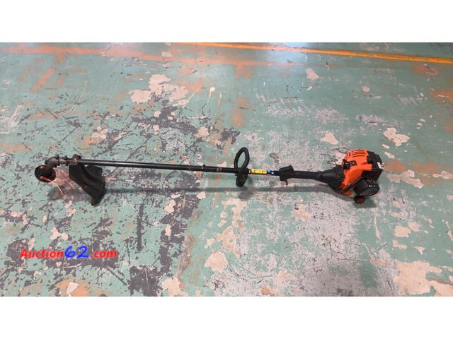 Lot 44-1642m - Remington Rustler RM2510 16" Curved Shaft Gas String Trimmer  -Seller states working E-Commerce Return, A basic inspection has been given to...