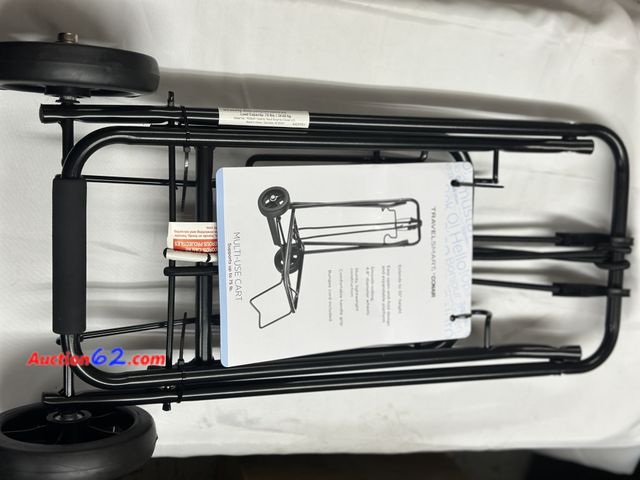 Lot 44-6141o - Travel Smart Conair luggage cart holds upto 75lbs extends to 35” easy open and close 4.8” wheels sturdy lightweight construction comfortable...