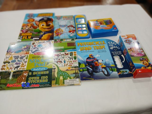 Lot 44-2106w - New Melissa and Doug Reusable sticker pad.  One new Motorcycle Road Trip book.  One nex 100 piece Paw patrol puzzle.  One new box of 64 cray...