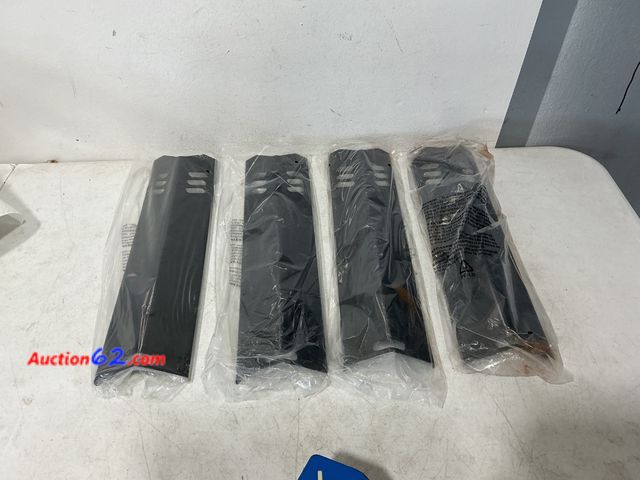 Lot 44-882e - Set of 4 Black Grill Burner Covers Heat Plates Shields Not Tested See All Photo's Appears New, A basic inspection has been given to this ite...