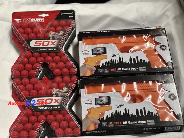 Lot 44-6125f - 4 pc lot 2 ar guns and 2 packs of x-shot dart balls. New. See All Photo's Not Tested Never opened, Factory Sealed