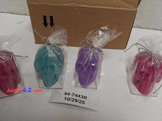 Lot 44-7443r - Skull Votive Candles, fragrance free, 2.44" H, 4 count  Appears New, A basic inspection has been given to this item. Sold AS-IS.
