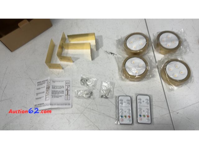 Lot 44-2766f - LED Puck Lights with Remote Control and Mounting Brackets Appears New, A basic inspection has been given to this item. Sold AS-IS. Not Teste...