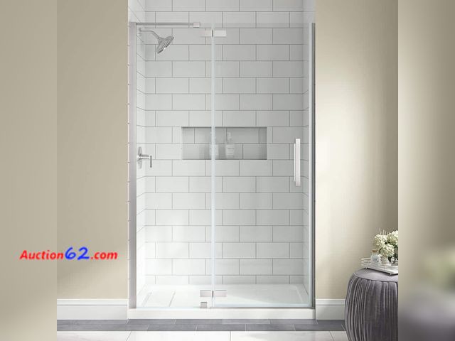 Lot 44-18i - $579 Retail price - Delaney 46 1/4 in. - 48 in. W X 74 in. H Pivot Frameless Shower Door in Brushed Nickel Finish with Clear Glass Appears N...