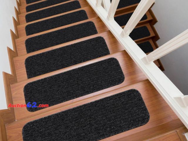Lot 44-694b - Retail value $33- Diego Dark Grey 28 in. x 8.7 in. Solid Non-Slip Rubber Back Stair Tread Cover (Set of 8) 1. Appears New, A basic inspectio...