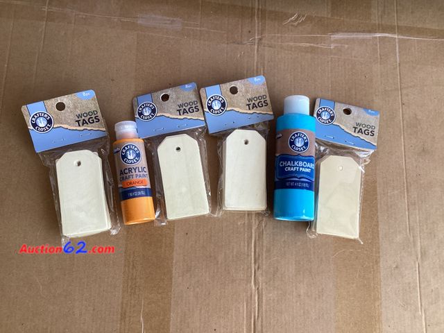 Lot 44-7726j - Lot of (4) 8 piece packs of wood tags, (1) 1.96oz bottle of orange acrylic paint, (1) 4oz bottle of blue chalkboard craft paint. Appears New...