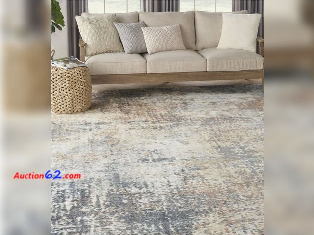 Lot 44-7208j - Nourison Quarry 7'×10' Ivory/Grey area rug  E-Commerce Return, A basic inspection has been given to this item. Sold AS-IS.