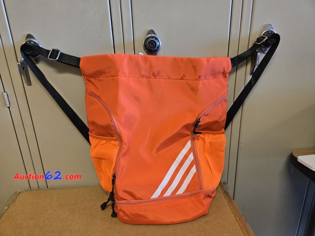 Lot 44-6531k - Oziral Drawstring Backpack, Water Resistant Drawstring Bag with Shoe Compartment and Two Side Mesh Pockets, Sports Gym Bag (Orange) Appears ...