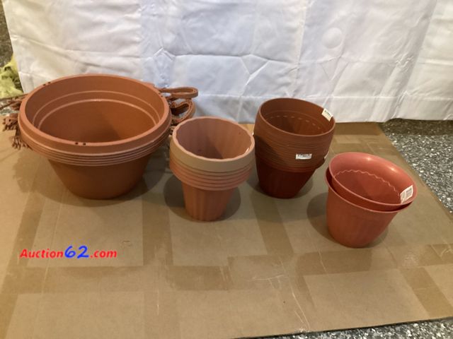 Lot 44-7753j - Lot of assorted hanging planters and plastic planters.  Appears New, A basic inspection has been given to this item. Sold AS-IS. See All Pho...