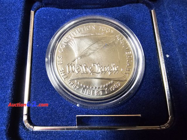 Lot 44-8332p - 1987 WE THE PEOPLE CONSTITUTION 90% SILVER COMMEMORATIVE DOLLAR. BRILLIANT UNCIRCULATED. COMES W/SPECS AND A CERTIFICATE OF AUTHENTICITY. IN...