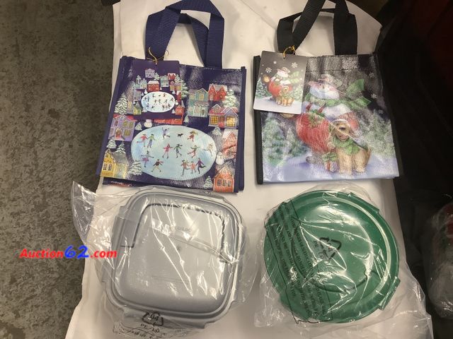 Lot 44-6112e - Set of 2 Tupperware Heritage food containers, comes with there own festive gift bags. Appears New, A basic inspection has been given to this...
