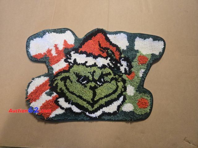 Lot 44-6516t - 16x24in Grinch Bath Mat Appears New, A basic inspection has been given to this item. Sold AS-IS.