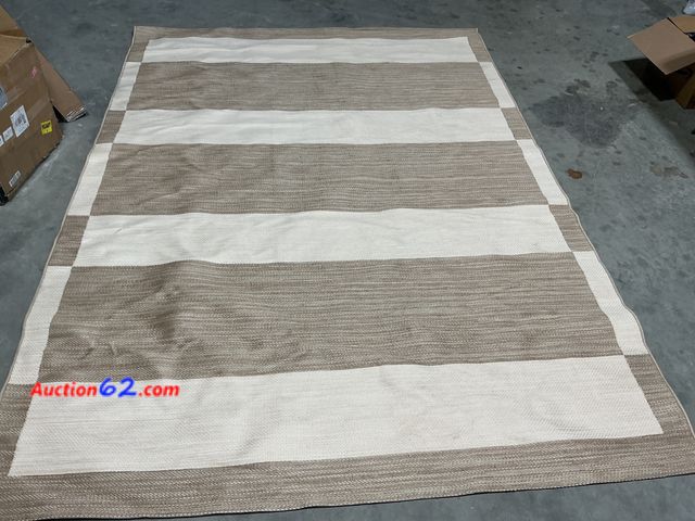 Lot 44-277 - Patio Rug Tonal Khaki 7ft x 10ft See All Photo's E-Commerce Return, A basic inspection has been given to this item. Sold AS-IS.