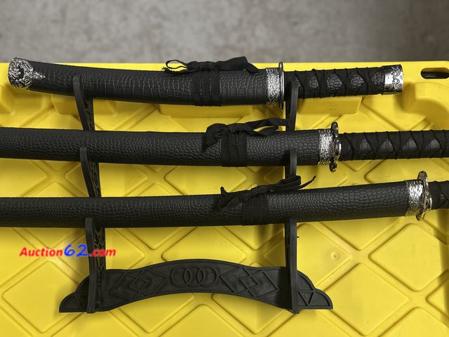 Lot 44-7525g - 3 pc Samurai sword set with display rack. Blades are metal but not sharp. New. See photos Not Tested Never opened, Factory Sealed